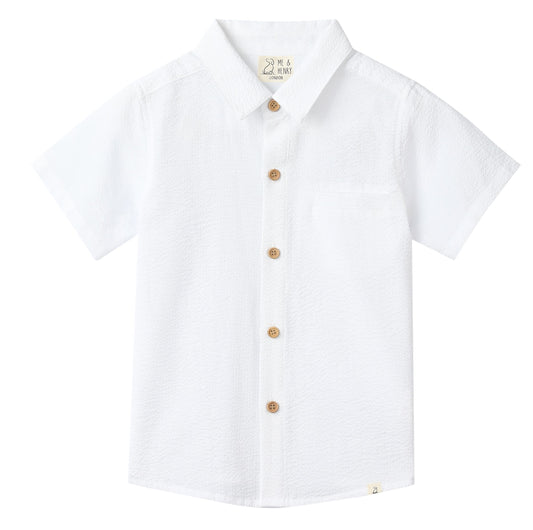 White short-sleeve shirt with gold buttons on a white background