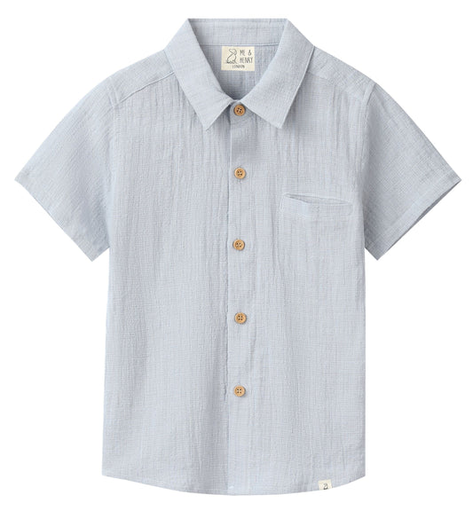 Light blue striped shirt with button details on a white background