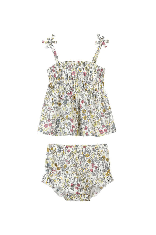 Floral baby romper set on a white background
