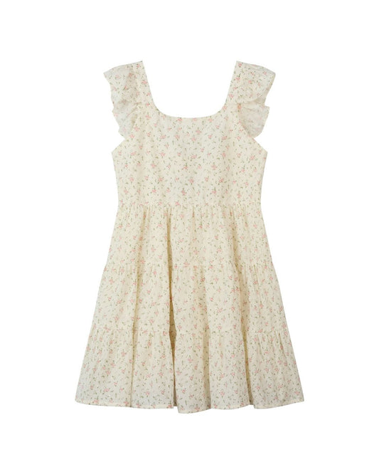 Cream dress with floral pattern on a white background
