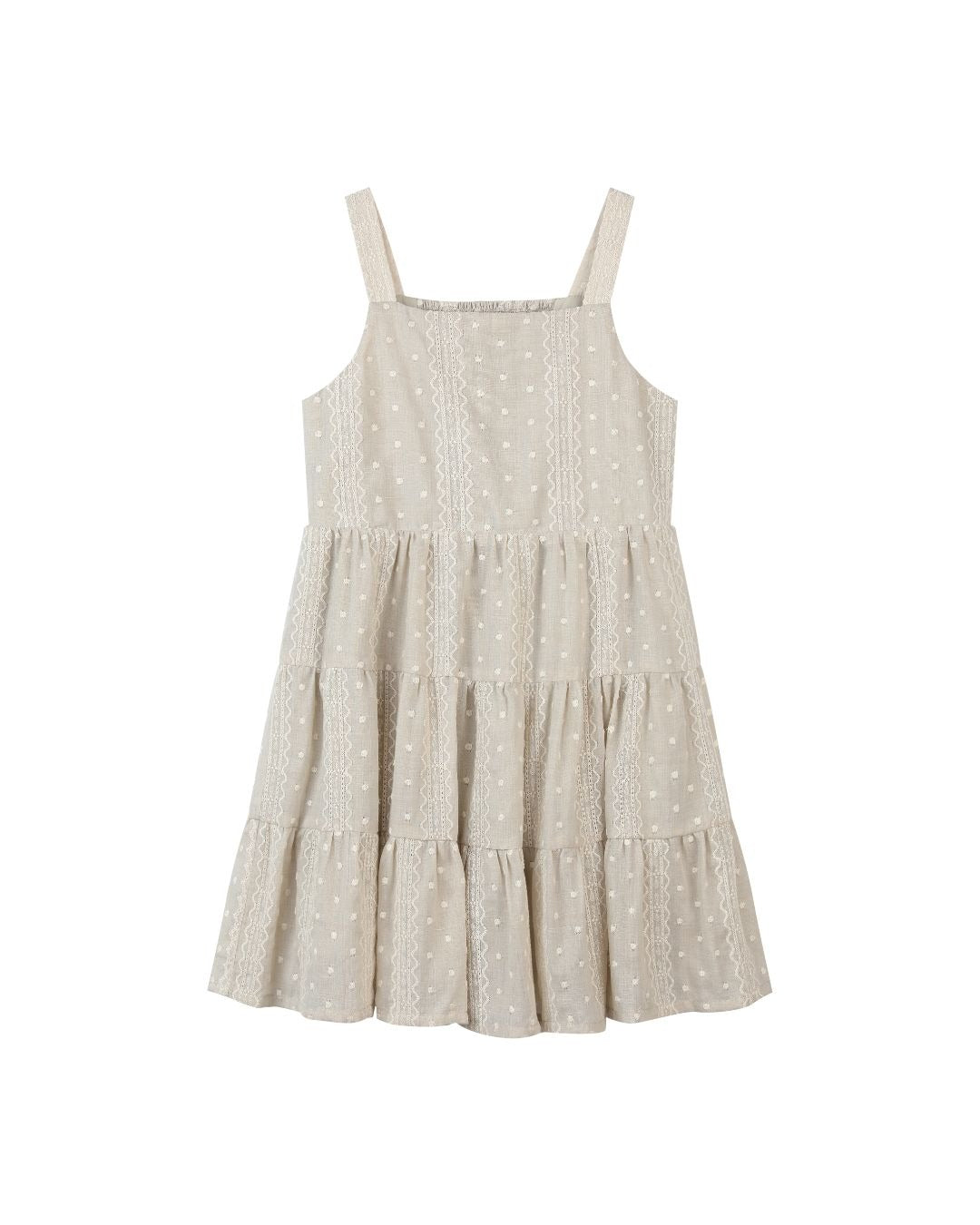 Beige tiered dress with white polka dots on a white background
