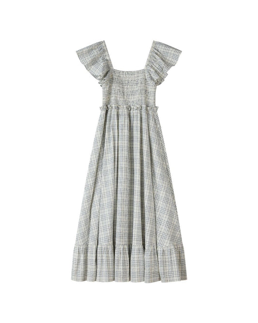 Checkered dress with ruffled shoulders on a white background
